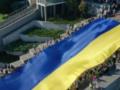  Наш путь сквозь бурные времена : в Одессе развернули 34-метровый флаг Украины. Фото и видео