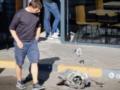 Двигатель реактивного дрона у входа в поврежденное здание АЗС: последствия атаки РФ в Голосеевском районе Киева. Фото и видео