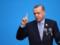The guards attacked the man who was trying to embrace Erdogan