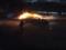 On the Moskva River, a ship is burning