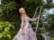 Ekaterina Osadchaya in a luxurious dress tried on the image of a girl-spring