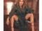 51-year-old Jennifer Lopez in a raincoat boasted slender legs