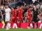 Liverpool with two cards of hearts, losing a draw against Tottenham